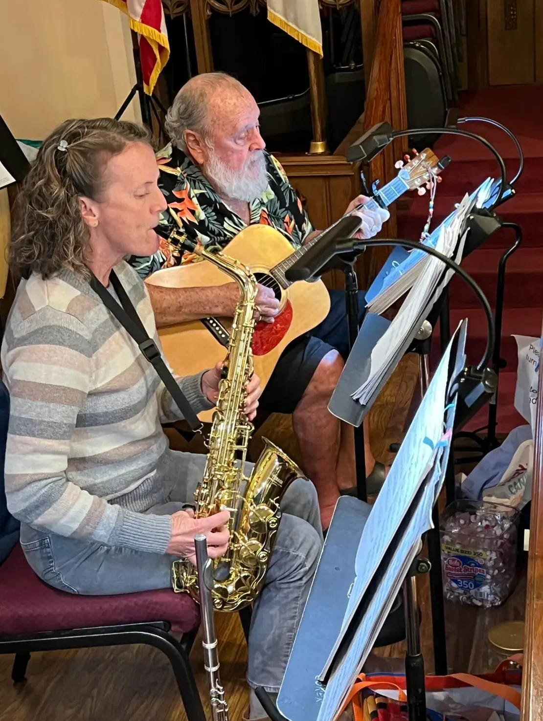 saxaphone and guitar player in worship